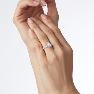 Goldsmiths Platinum 0.80cttw Diamond Pear Cut Halo Engagement Ring Goldsmiths Platinum 0.80cttw Diamond Pear Cut Halo Engagement Ring