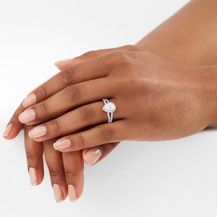 Goldsmiths Platinum 1.00cttw Diamond Pear Cut Halo Ring