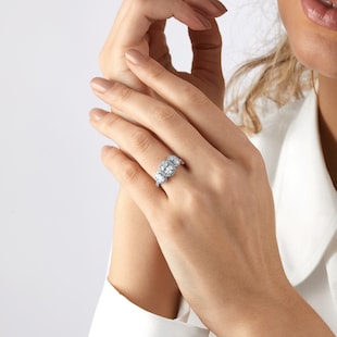 Mappin & Webb Amelia Platinum 2.00cttw Oval Cut Diamond Halo Three Stone Ring
