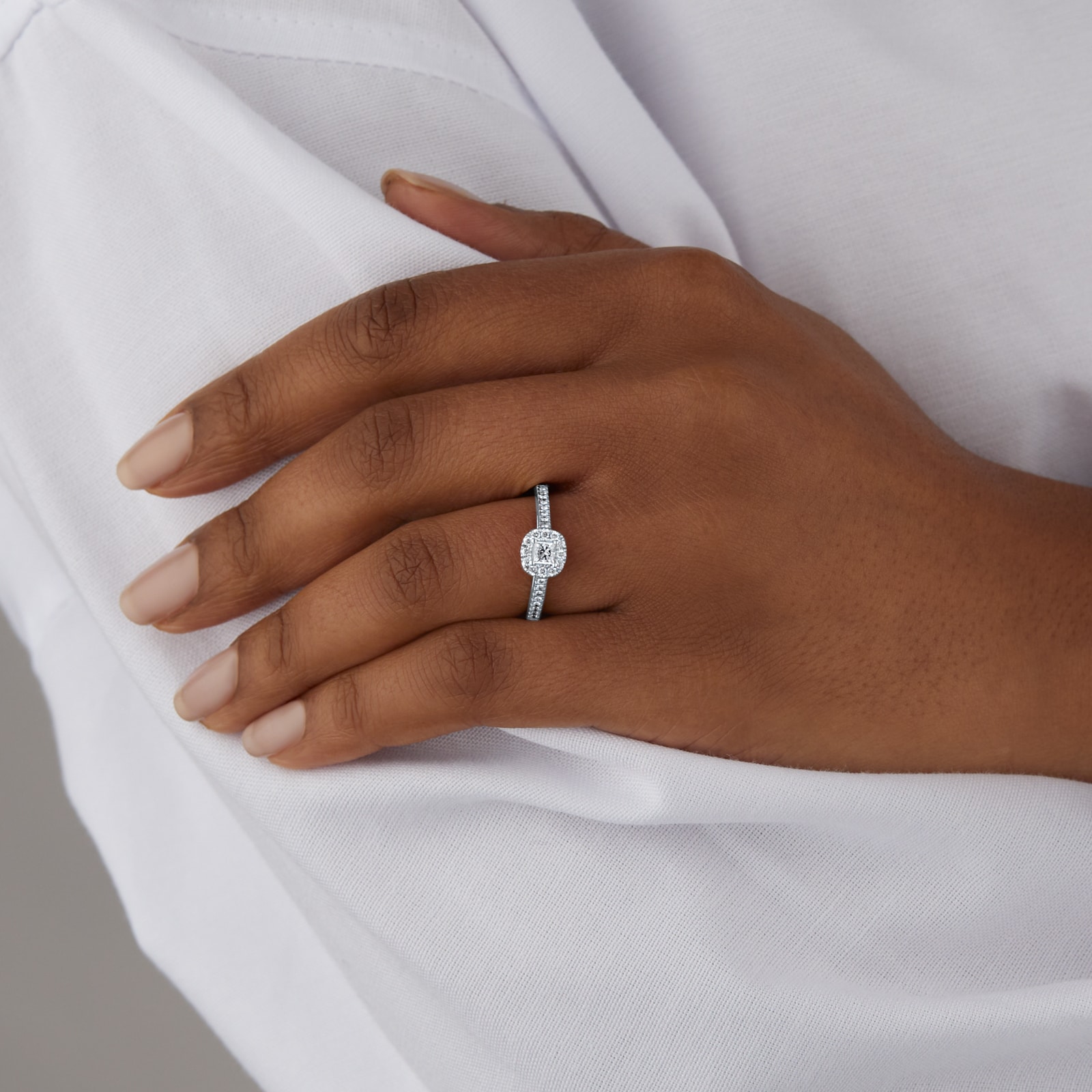 Goldsmiths Platinum 0.60cttw Princess Cut Diamond Halo Engagement Ring Goldsmiths Platinum 0.60cttw Princess Cut Diamond Halo Engagement Ring