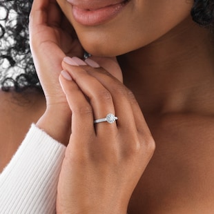 Goldsmiths Platinum 0.50cttw Brilliant Cut Diamond Halo Engagement Ring