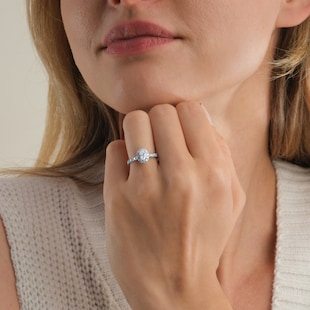 Goldsmiths Platinum 0.80cttw Oval Diamond Halo Engagement Ring