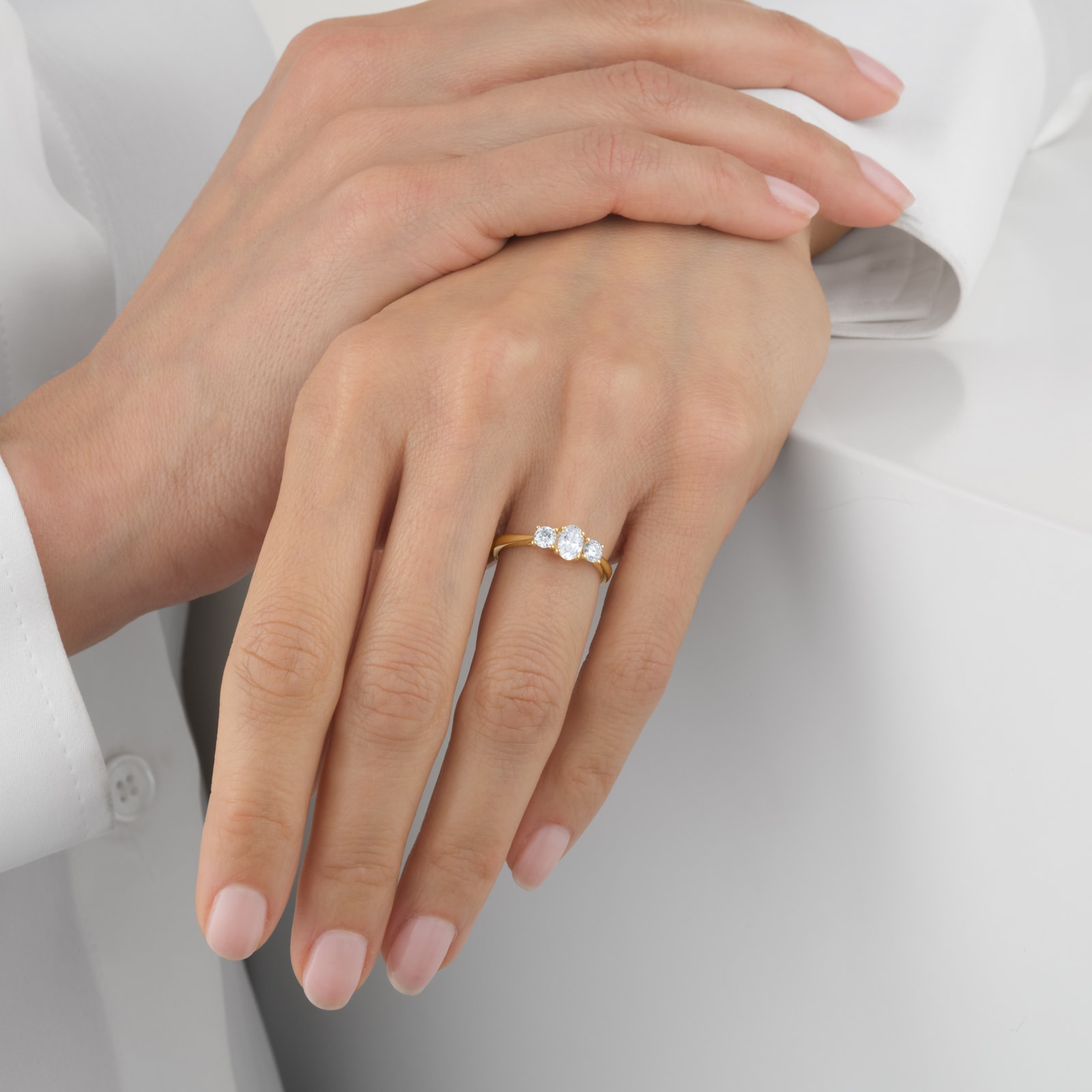 Goldsmiths 18ct Yellow Gold 0.75cttw Oval and Brilliant Cut Diamond Three Stone Engagement Ring Goldsmiths 18ct Yellow Gold 0.75cttw Oval and Brilliant Cut Diamond Three Stone Engagement Ring