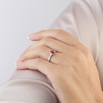 Goldsmiths Platinum Oval Cut Ruby and Diamond Three Stone Engagement Ring Goldsmiths Platinum Oval Cut Ruby and Diamond Three Stone Engagement Ring