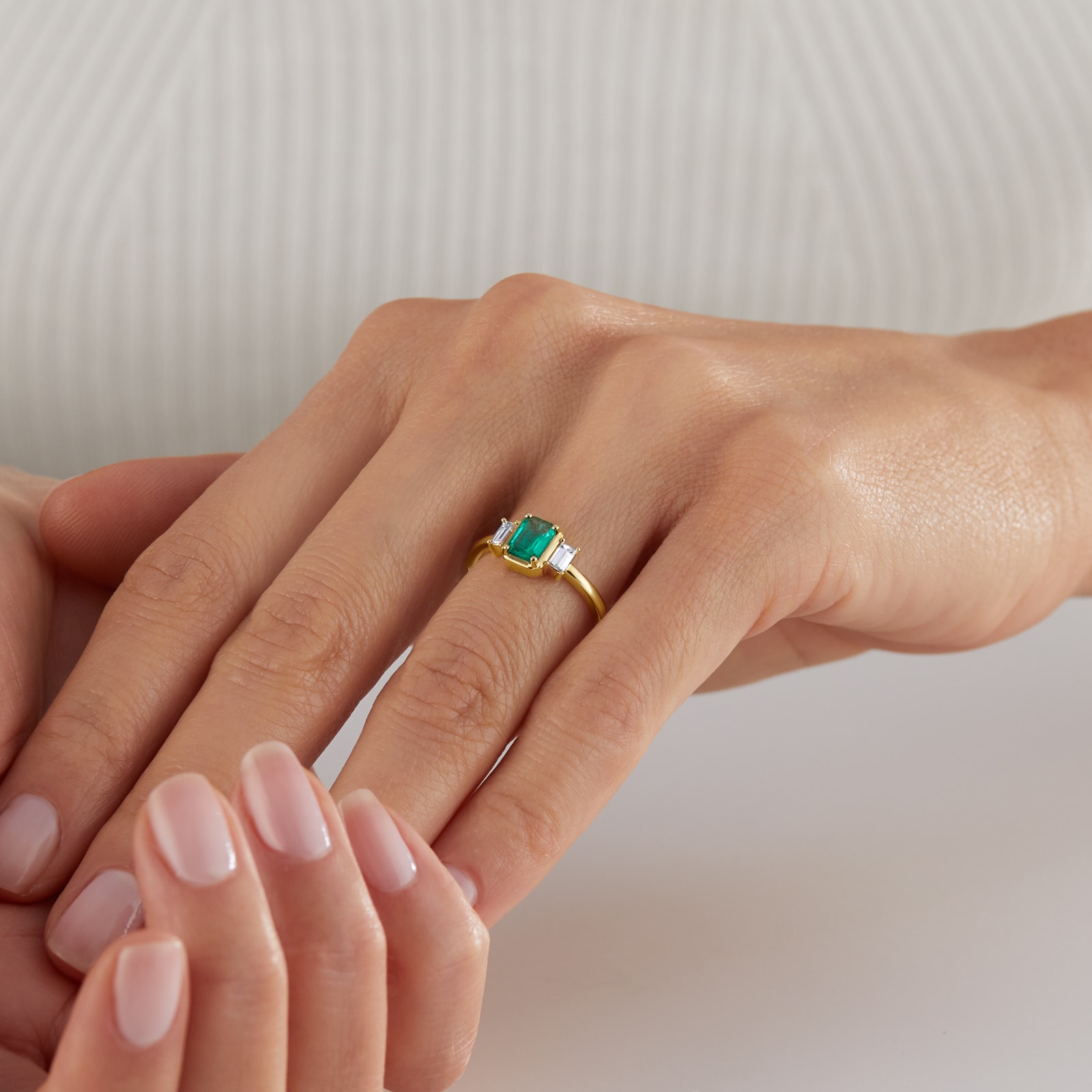 Goldsmiths 18ct Yellow Gold Emerald and 0.30cttw Diamond Three Stone Engagement Ring