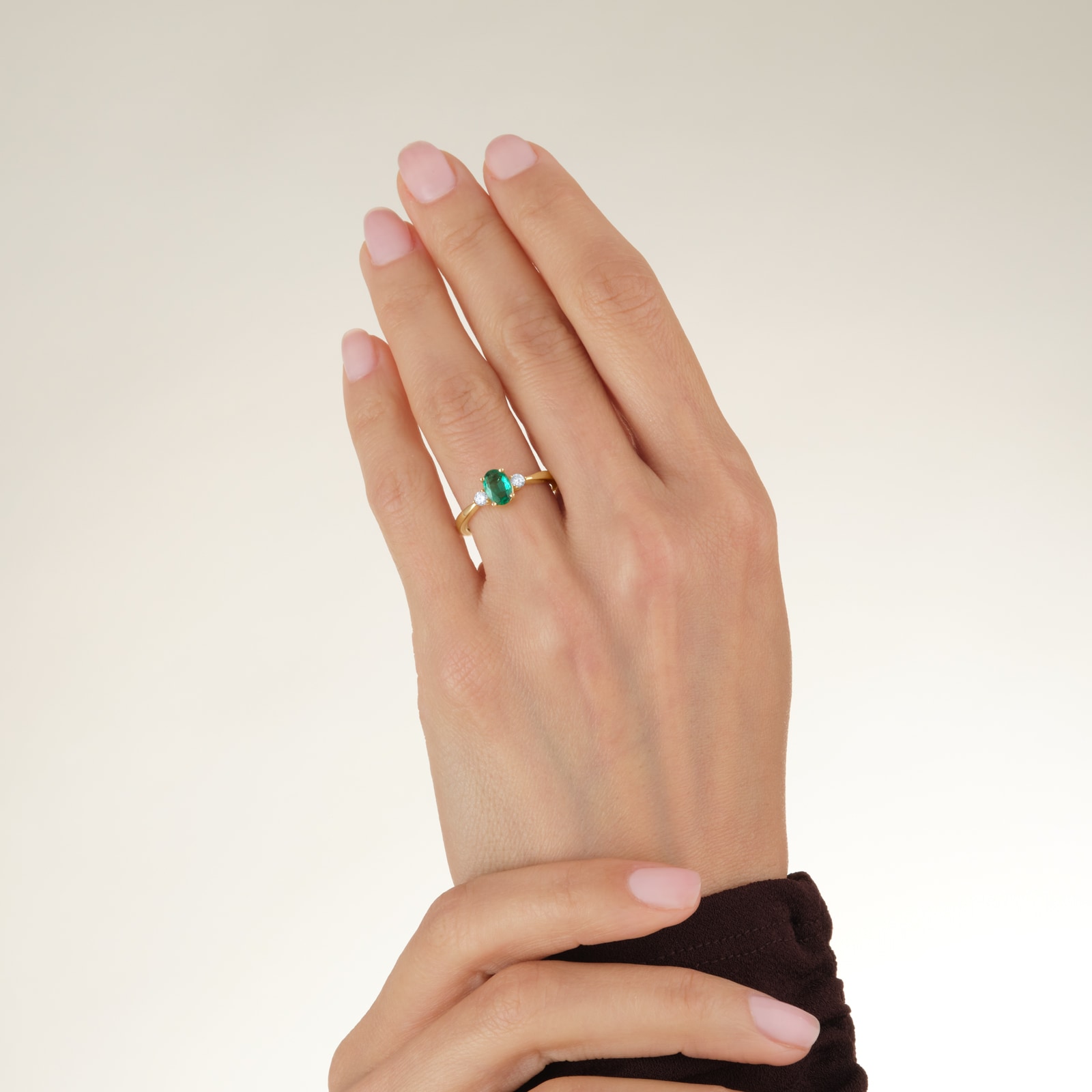 Goldsmiths 18ct Yellow Gold Oval Cut Emerald and 0.15cttw Diamond Three Stone Engagement Ring