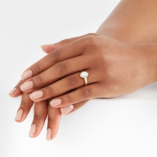 Goldsmiths Oval Cut Opal And Diamond Set Ring In 9 Carat Yellow Gold