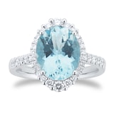 Goldsmiths Platinum Oval Cut Aquamarine and 0.40cttw Diamond Halo Ring