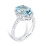 Goldsmiths Platinum Oval Cut Aquamarine and 0.40cttw Diamond Halo Ring