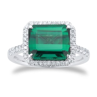 Goldsmiths Platinum Green Tourmaline and 0.25cttw Diamond Halo Ring