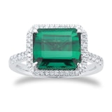 Goldsmiths Platinum Green Tourmaline and 0.25cttw Diamond Halo Ring