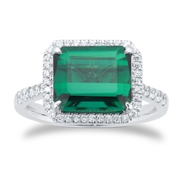 06290016 - Platinum Green Tourmaline and 0.25cttw Diamond Halo Ring