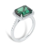 Goldsmiths Platinum Green Tourmaline and 0.25cttw Diamond Halo Ring
