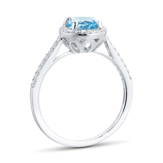 Goldsmiths 9ct White Gold 6x6mm Blue Topaz And Diamond Round Halo Ring Goldsmiths 9ct White Gold 6x6mm Blue Topaz And Diamond Round Halo Ring