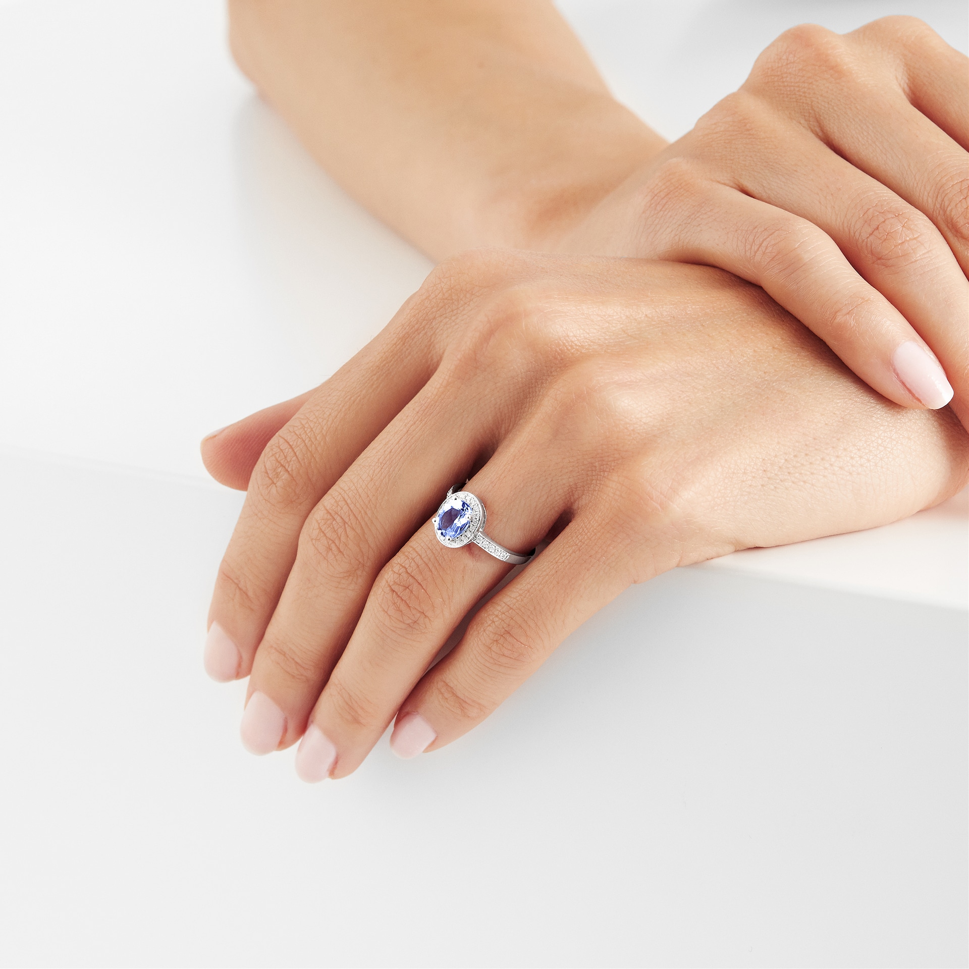 Goldsmiths 9ct White Gold Tanzanite & Diamond Halo Ring Goldsmiths 9ct White Gold Tanzanite & Diamond Halo Ring