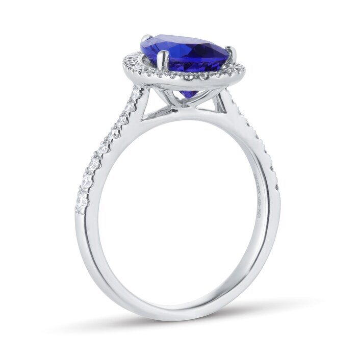 Goldsmiths Platinum Pear Cut Tanzanite and 0.33cttw Diamond Halo Ring