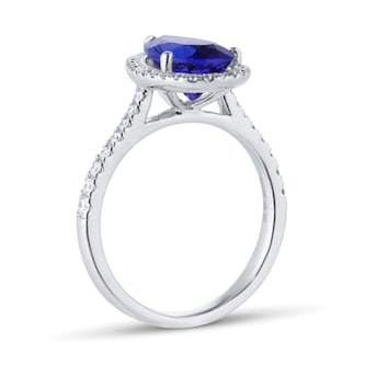 Goldsmiths Platinum Pear Cut Tanzanite and 0.33cttw Diamond Halo Ring