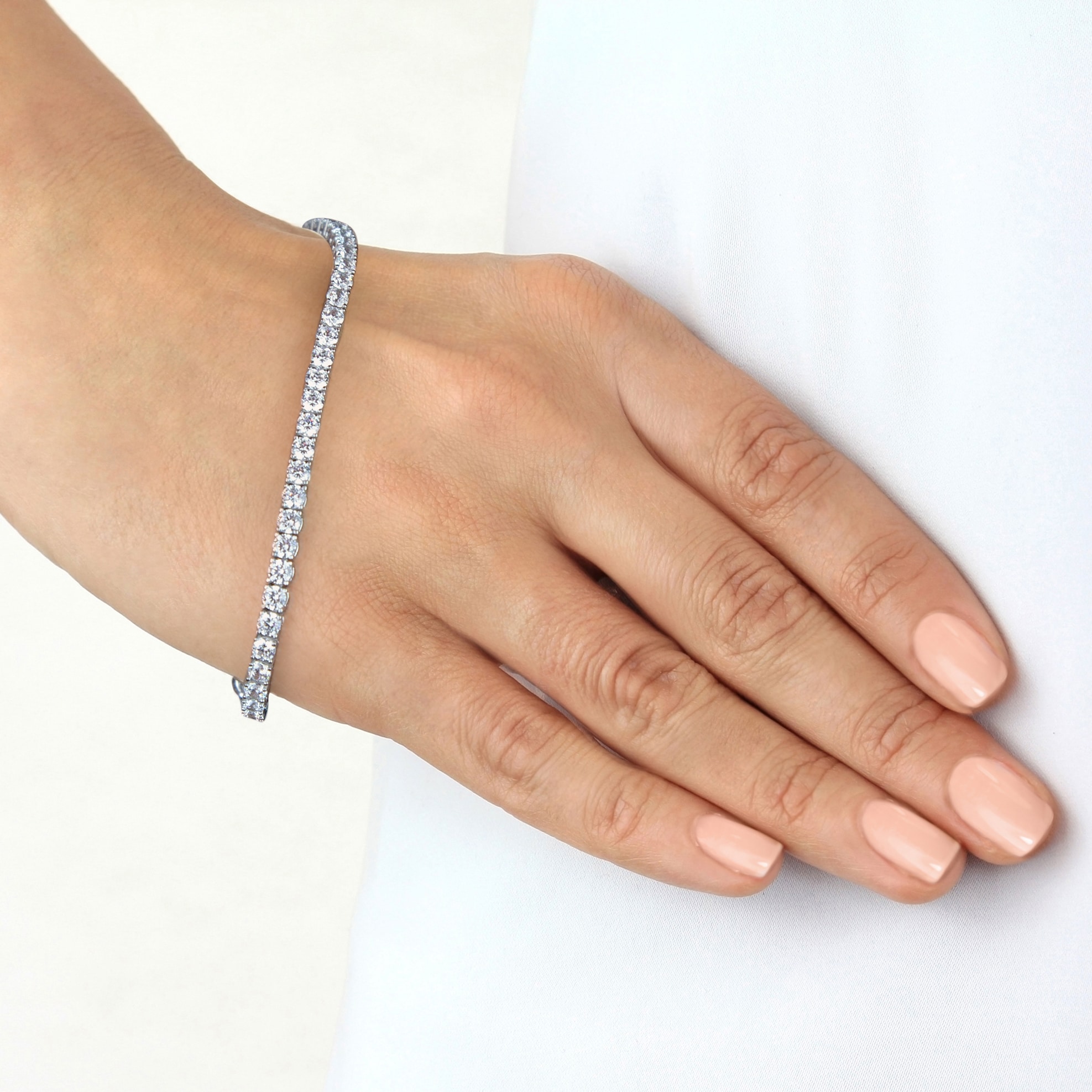 Goldsmiths 9ct White Gold 2mm Square Cubic Zirconia Tennis Bracelet Goldsmiths 9ct White Gold 2mm Square Cubic Zirconia Tennis Bracelet