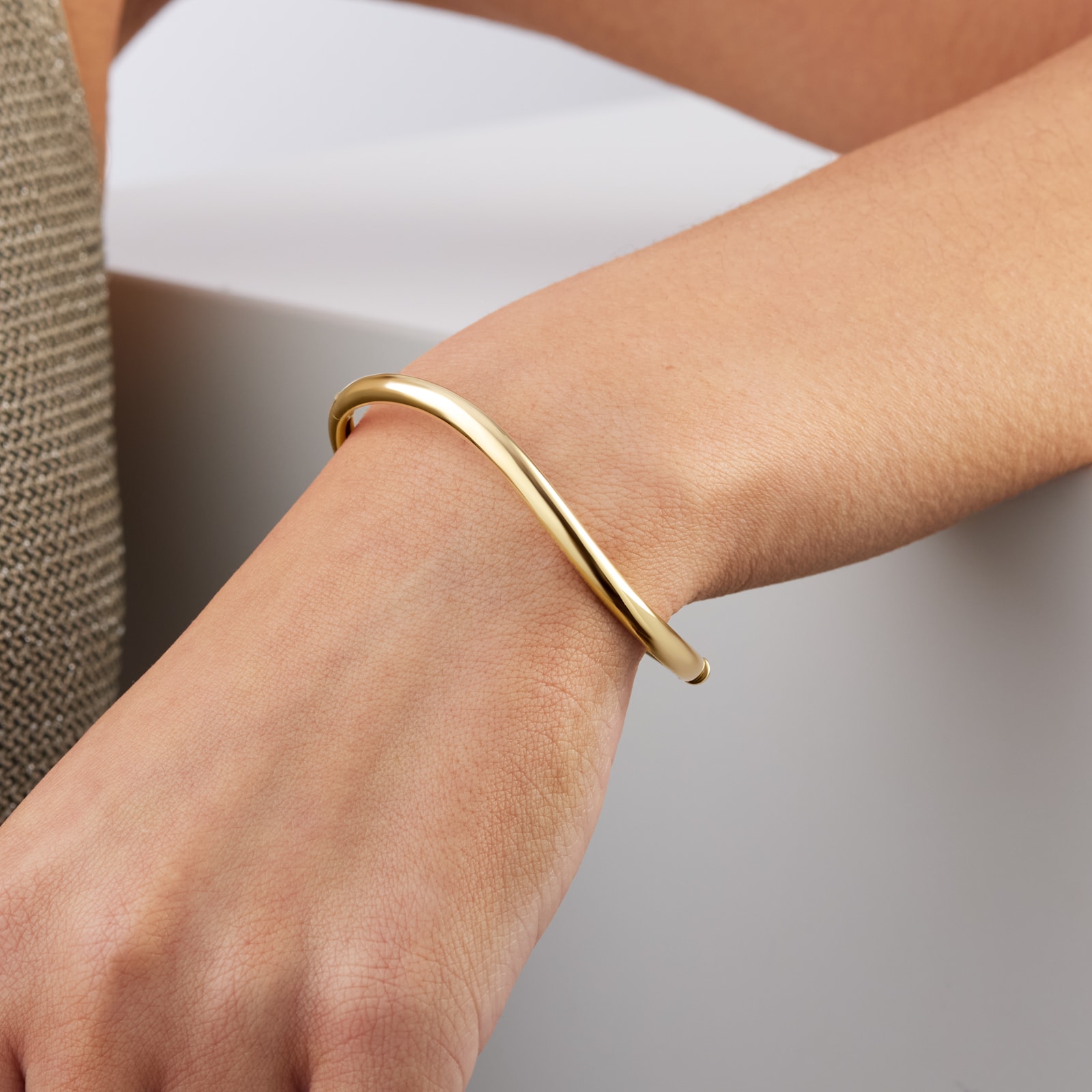 Goldsmiths 9ct Yellow Gold Wave Domed Bangle Goldsmiths 9ct Yellow Gold Wave Domed Bangle