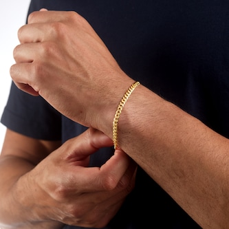 Goldsmiths Sterling Silver and Yellow Gold Plated Curb Chain Bracelet Goldsmiths Sterling Silver and Yellow Gold Plated Curb Chain Bracelet