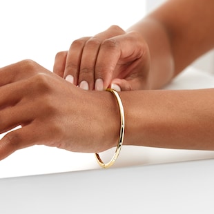 Goldsmiths 9ct Yellow Gold 0.08cttw Diamond Set Bangle