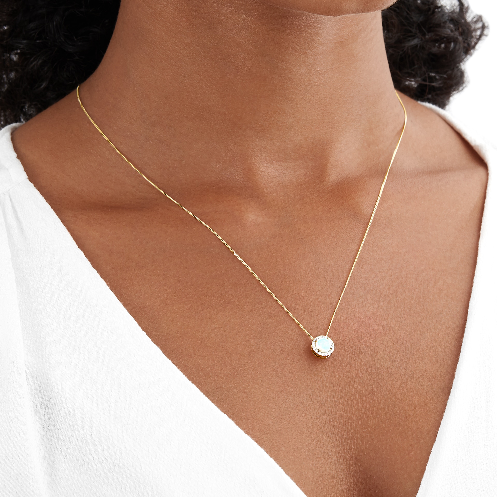 Goldsmiths 9ct Yellow Gold 5.5mm Opal And Diamond 0.11ct Halo Pendant Goldsmiths 9ct Yellow Gold 5.5mm Opal And Diamond 0.11ct Halo Pendant