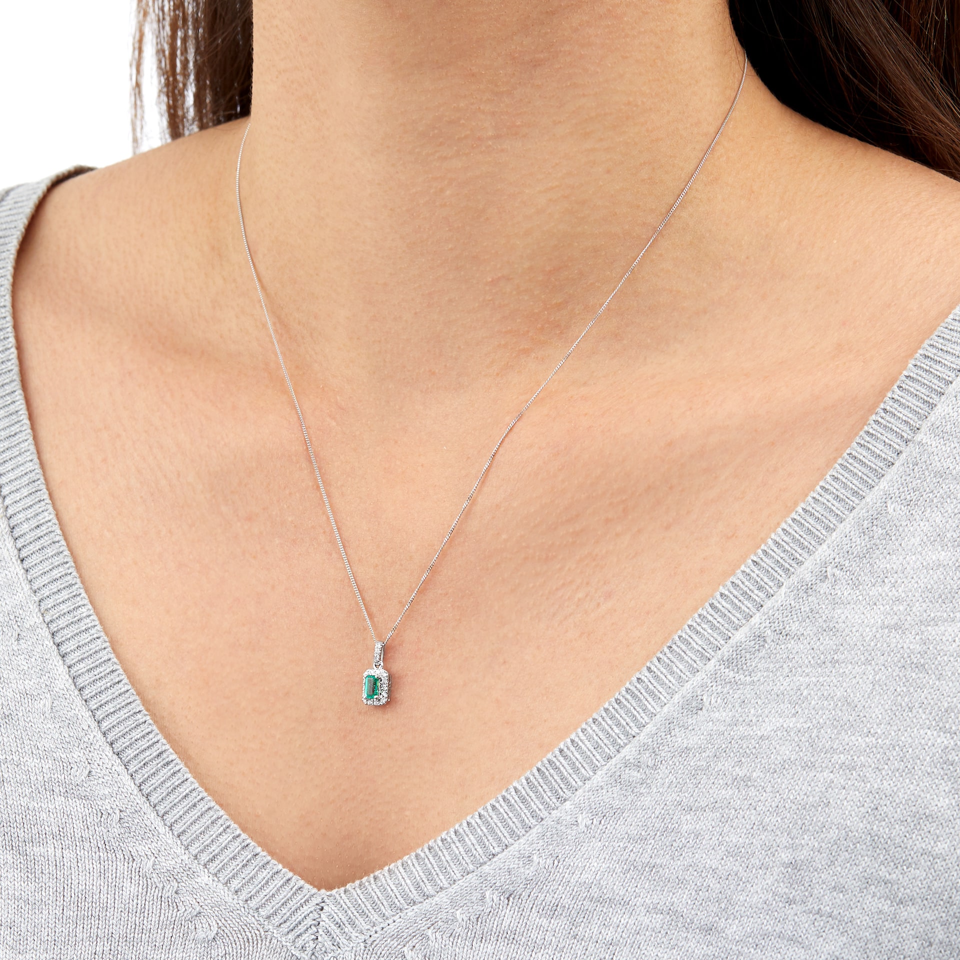 Goldsmiths 9ct White Gold Emerald and Diamond Halo Pendant