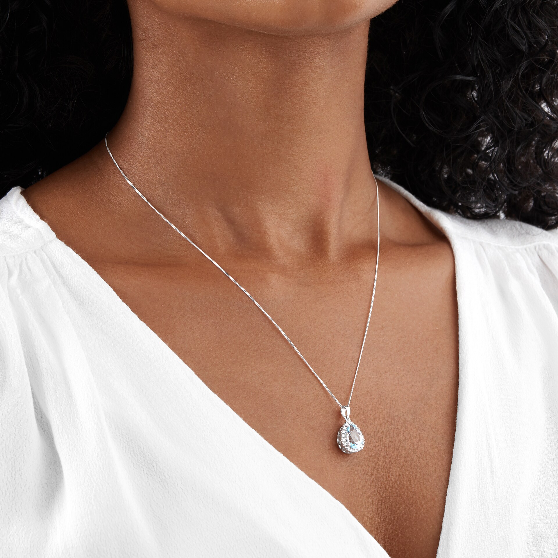 Goldsmiths 9ct White Gold Pear Cut Topaz & Diamond Pendant