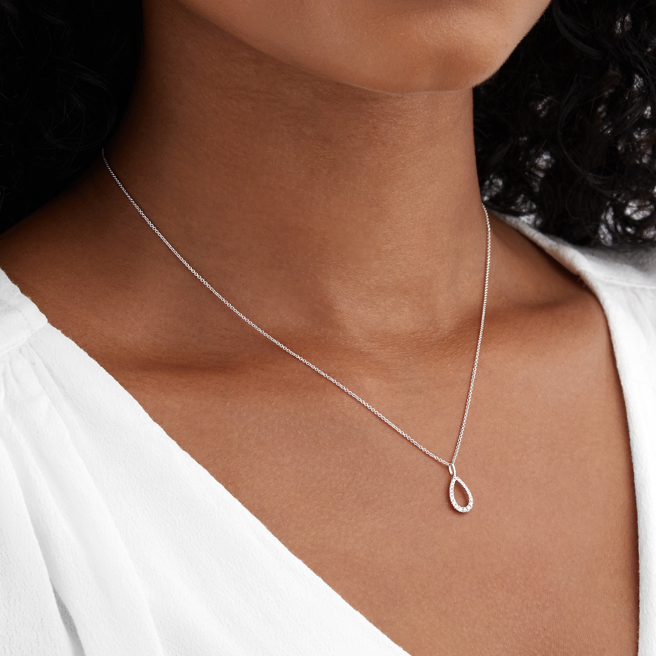Goldsmiths 9ct White Gold 0.07cttw Diamond Open Pear Pendant Goldsmiths 9ct White Gold 0.07cttw Diamond Open Pear Pendant