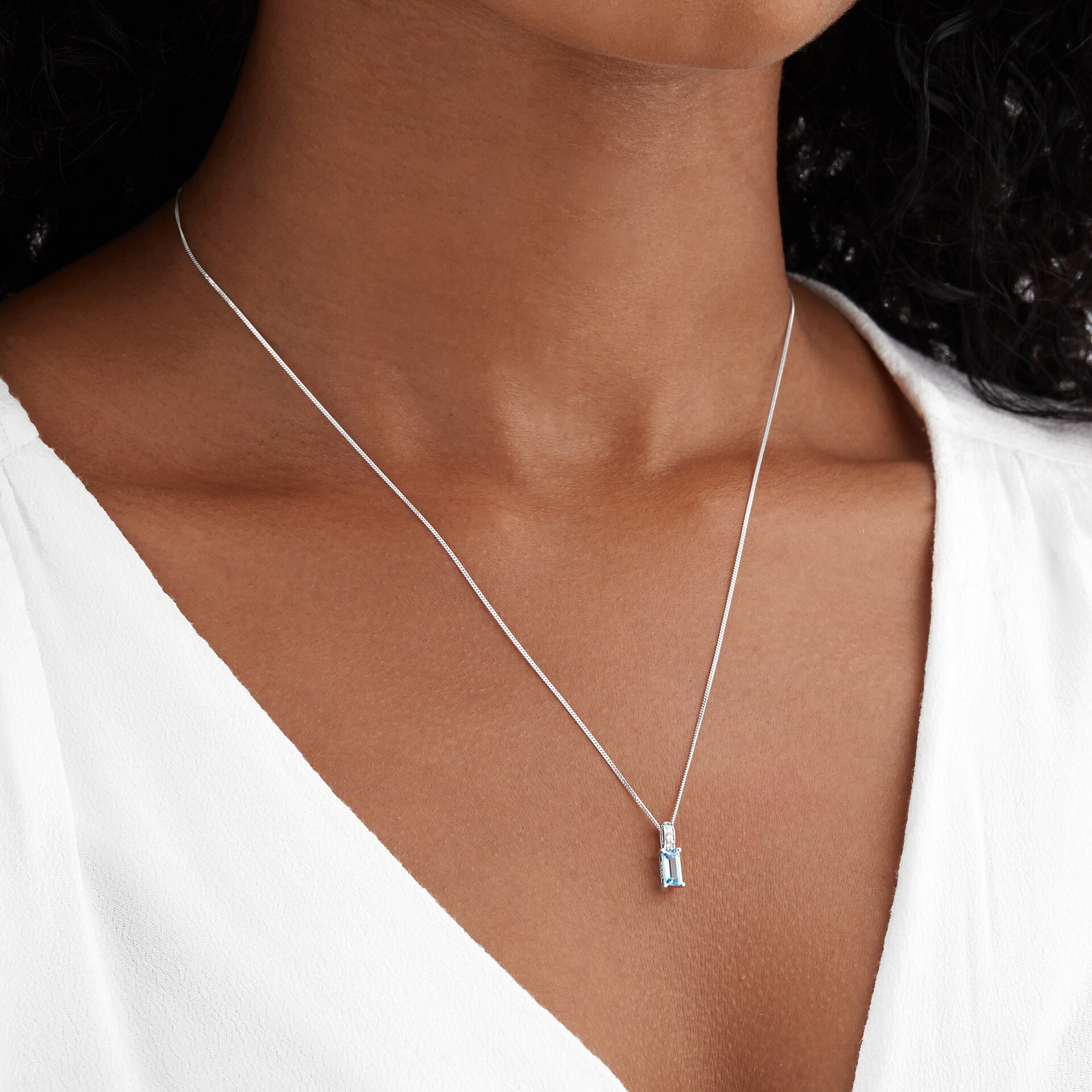 Goldsmiths 9ct White Gold Blue Topaz & Diamond Pendant