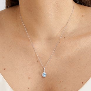 Goldsmiths 18ct White Gold 0.15ct Diamond & Blue Topaz Halo Pendant