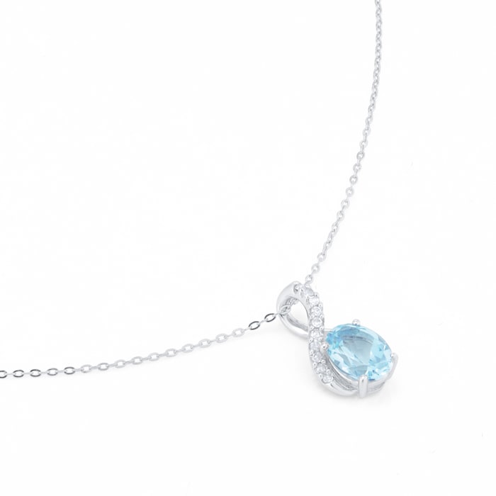 Goldsmiths 9ct White Gold 0.05cttw Diamond & Blue Topaz Pendant