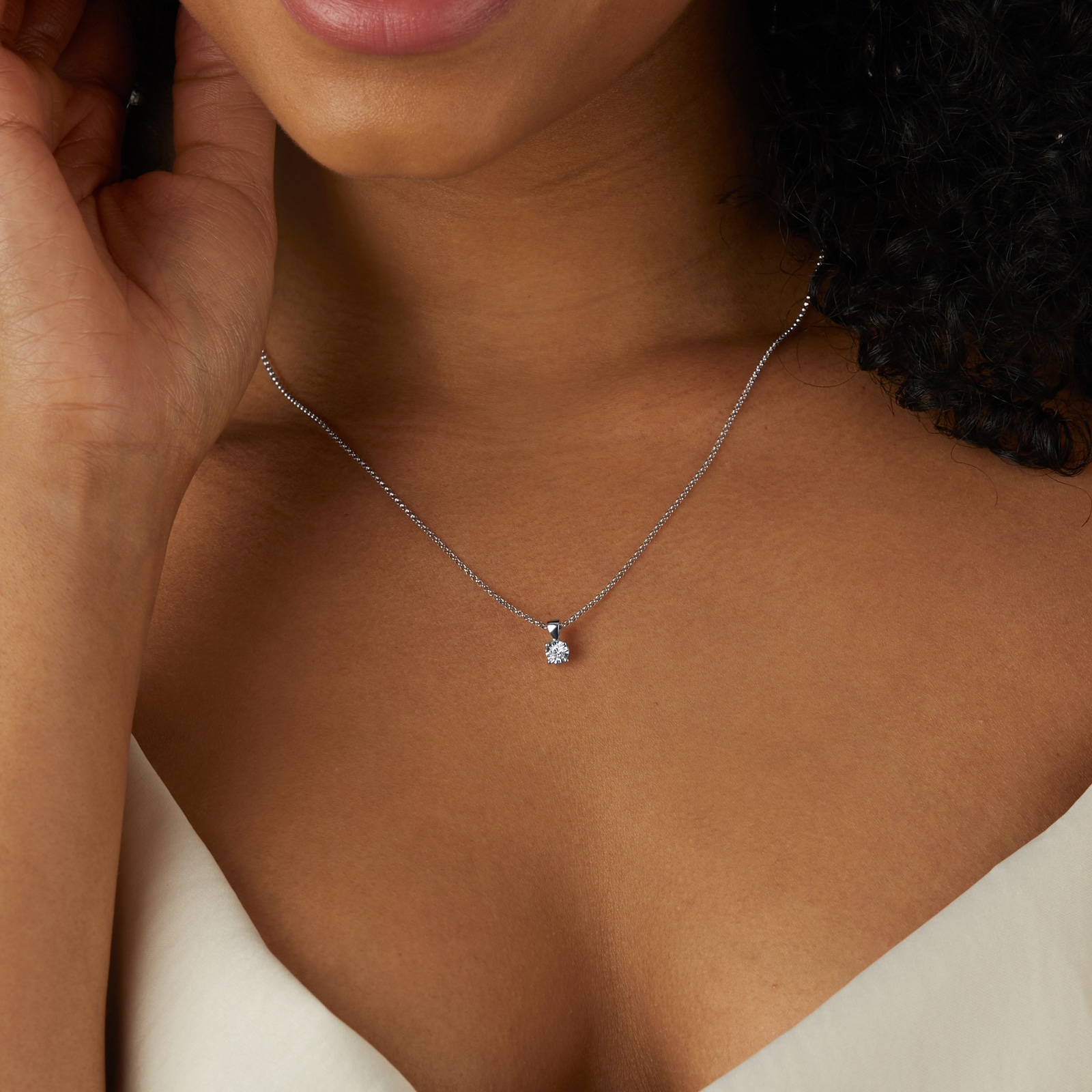 Goldsmiths 9ct White Gold 0.10cttw Diamond Illusion Set Pendant