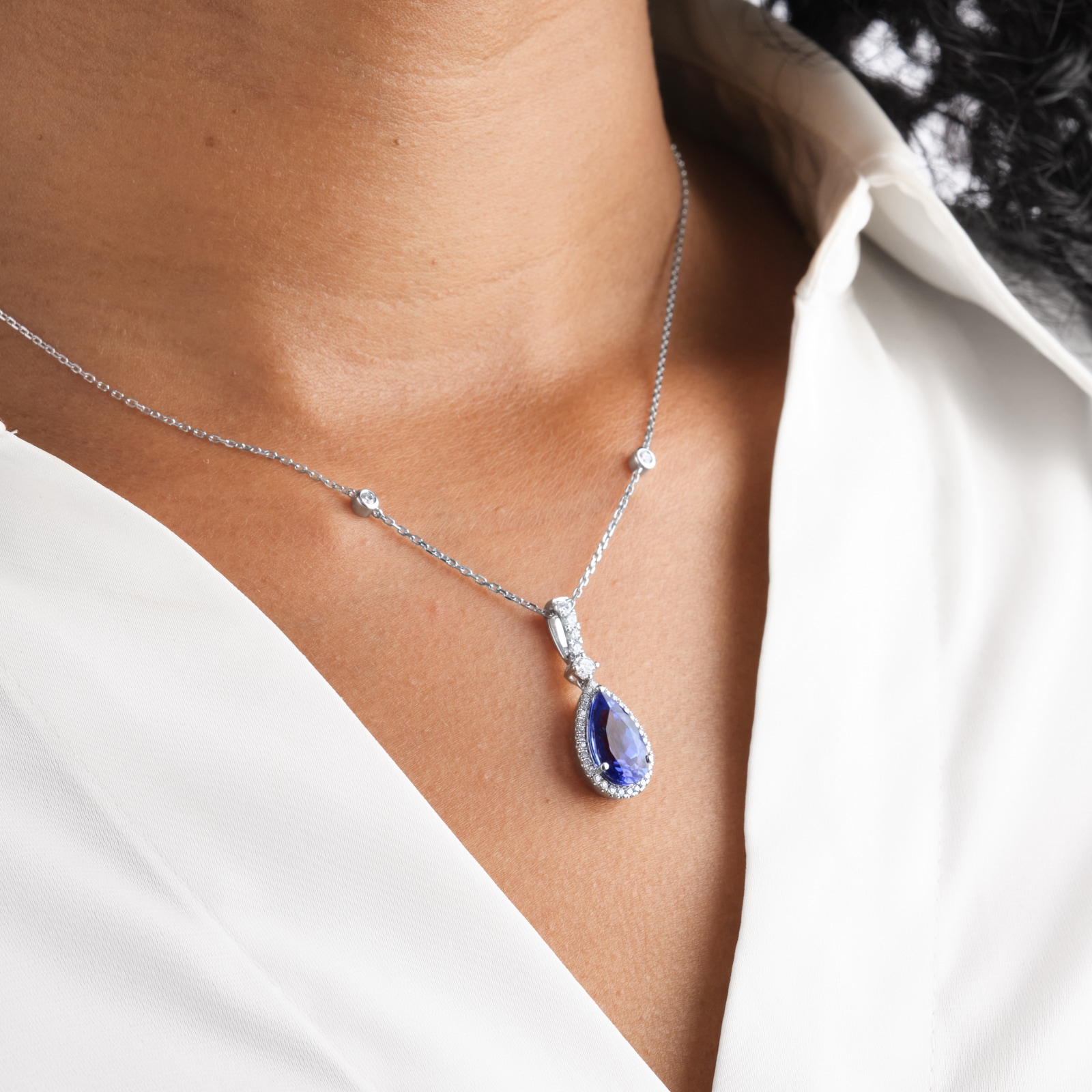 Goldsmiths 18ct White Gold Pear Cut Tanzanite and 0.30cttw Diamond Pendant