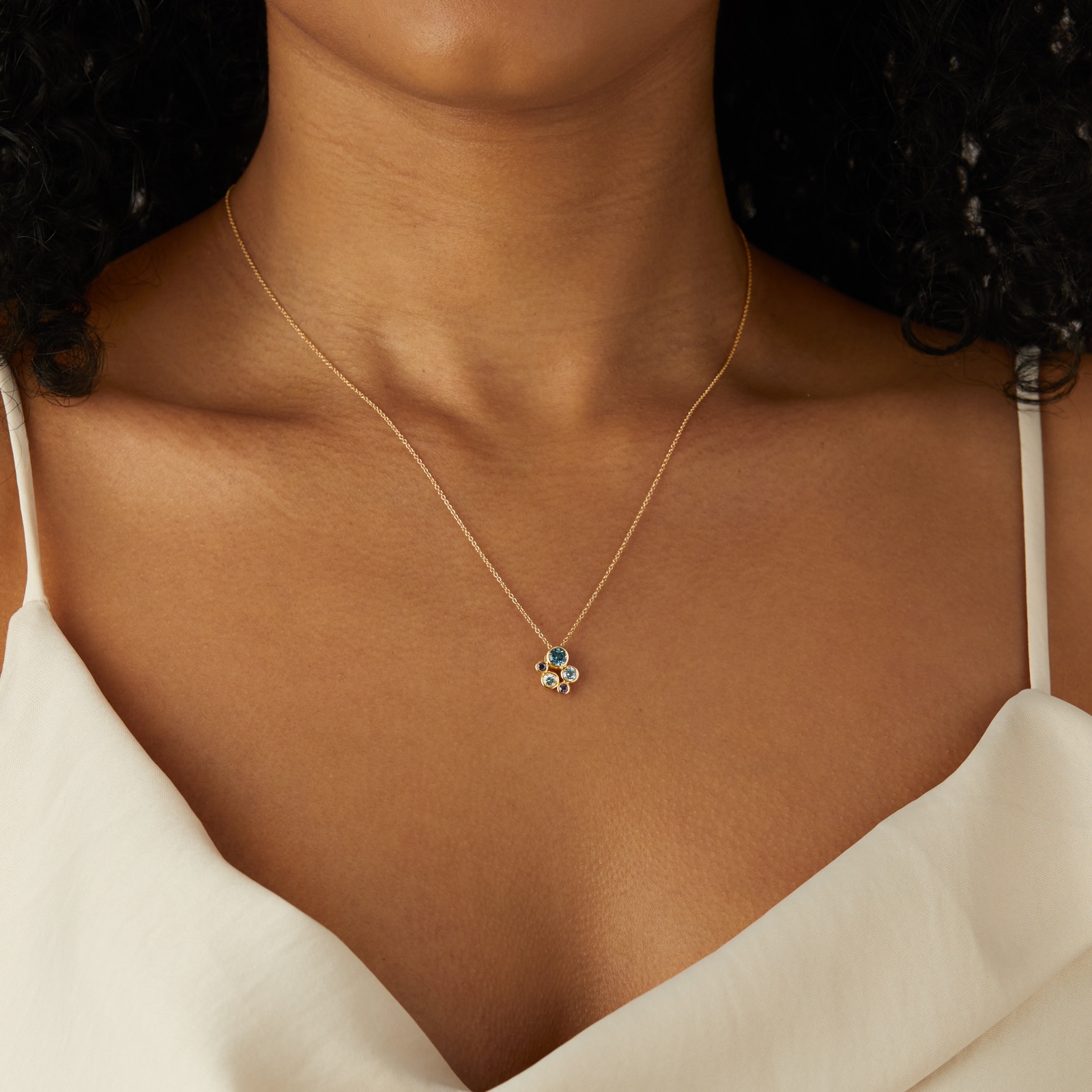 Goldsmiths 18ct Yellow Gold Sapphire Aquamarine and Blue Topaz Bezel Set Pendant