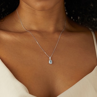 Goldsmiths 18ct White Gold Emerald Cut Aquamarine and 0.04cttw Diamond Pendant