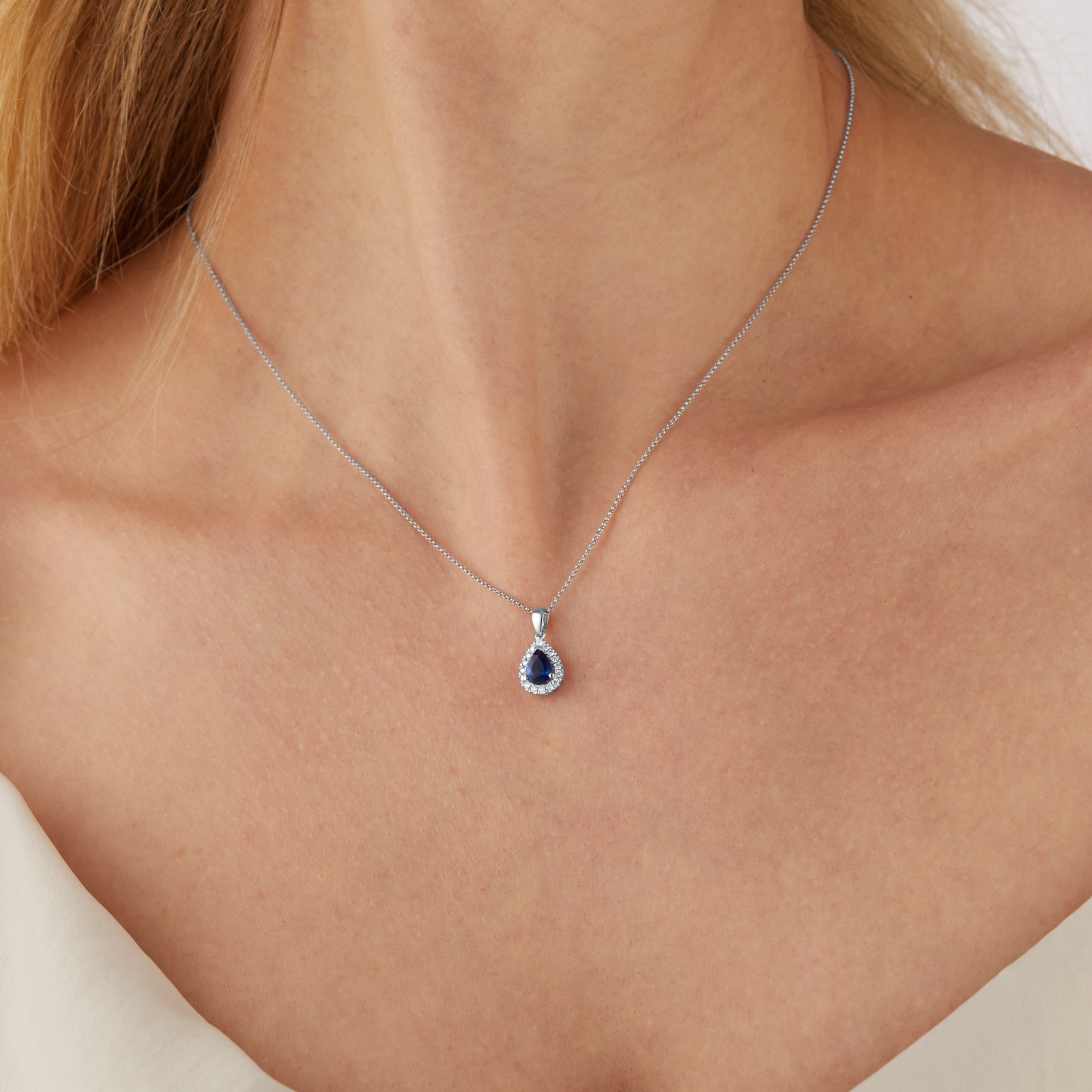 Mappin & Webb Amelia 18ct White Gold 7mm x 5mm Pear Cut Sapphire & Diamond Halo Pendant Mappin & Webb Amelia 18ct White Gold 7mm x 5mm Pear Cut Sapphire & Diamond Halo Pendant