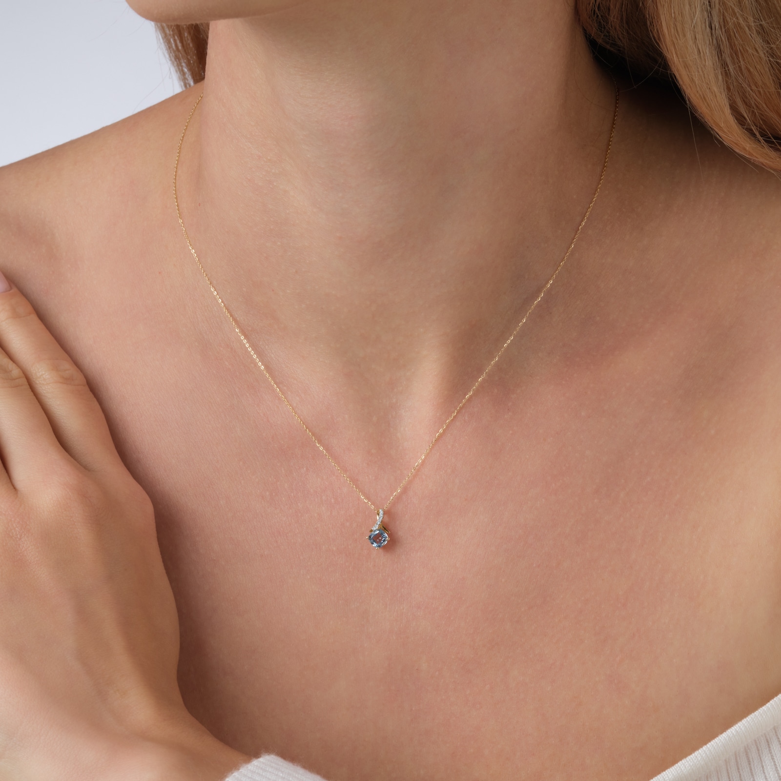 Goldsmiths 9ct Yellow Gold Cushion Cut Blue Topaz and Diamond Pendant