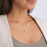 Goldsmiths 9ct Yellow Gold 0.20cttw Oval Halo Diamond Pendant