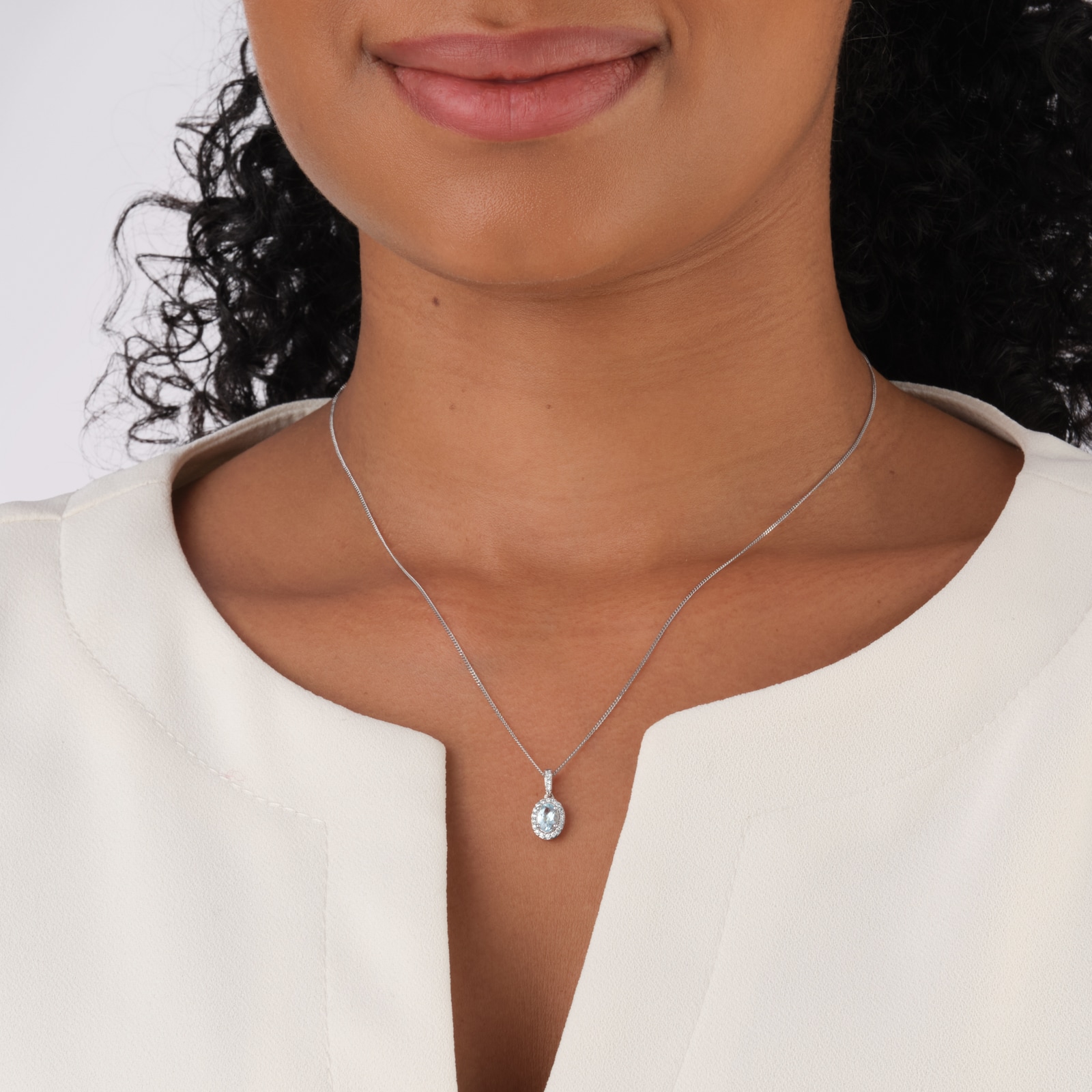 Best Luxury 
9ct White Gold 0.52cttw Oval Aquamarine and 0.10cttw Diamond Halo Pendant