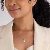 Goldsmiths 9ct White Gold 0.15cttw Diamond and Emerald Cut Aquamarine Halo Pendant