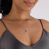 Mappin & Webb 18ct White Gold Emerald Cut Sapphire & 0.18cttw Diamond Halo Pendant