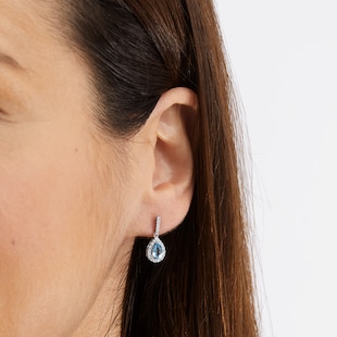 Best Luxury 
18ct White Gold 0.20ct Diamond 
Blue Topaz Halo Earrings
