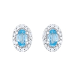 12153604 - 9ct White Gold Oval Blue Topaz and 0.10cttw Diamond Halo Stud Earrings