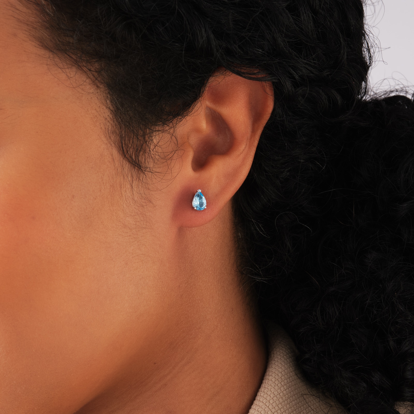 Goldsmiths 9ct White Gold Pear Cut Swiss Blue Topaz Stud Earrings Goldsmiths 9ct White Gold Pear Cut Swiss Blue Topaz Stud Earrings