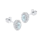 Goldsmiths 9ct White Gold Oval Aquamarine and 0.10cttw Diamond Halo Stud Earrings