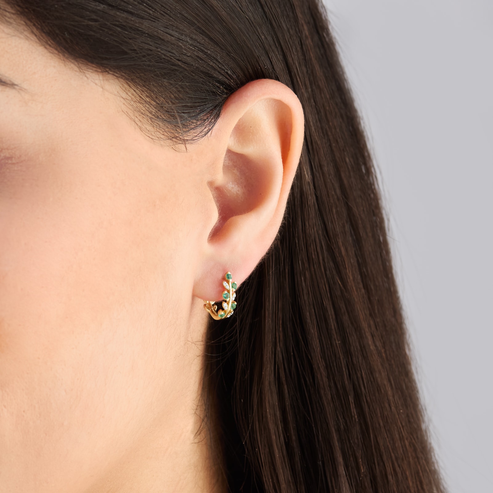 Goldsmiths 9ct Yellow Gold Diamond and Emerald Leaf Hoop Earrings Goldsmiths 9ct Yellow Gold Diamond and Emerald Leaf Hoop Earrings