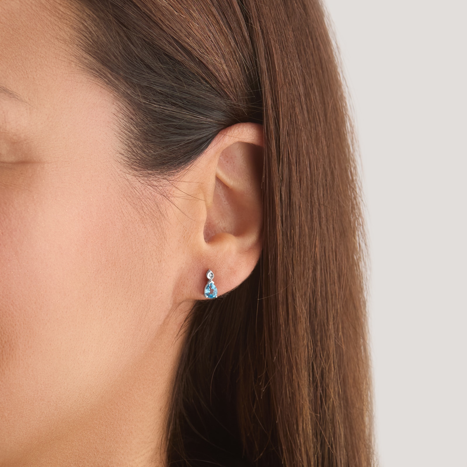 Goldsmiths 9ct White Gold Pear Cut Swiss Blue Topaz and Diamond Stud Earrings Goldsmiths 9ct White Gold Pear Cut Swiss Blue Topaz and Diamond Stud Earrings