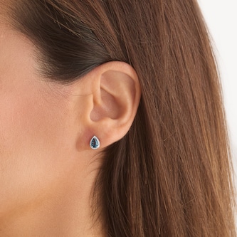 Goldsmiths 9ct White Gold Pear Cut London Blue Topaz and Diamond Stud Earrings Goldsmiths 9ct White Gold Pear Cut London Blue Topaz and Diamond Stud Earrings