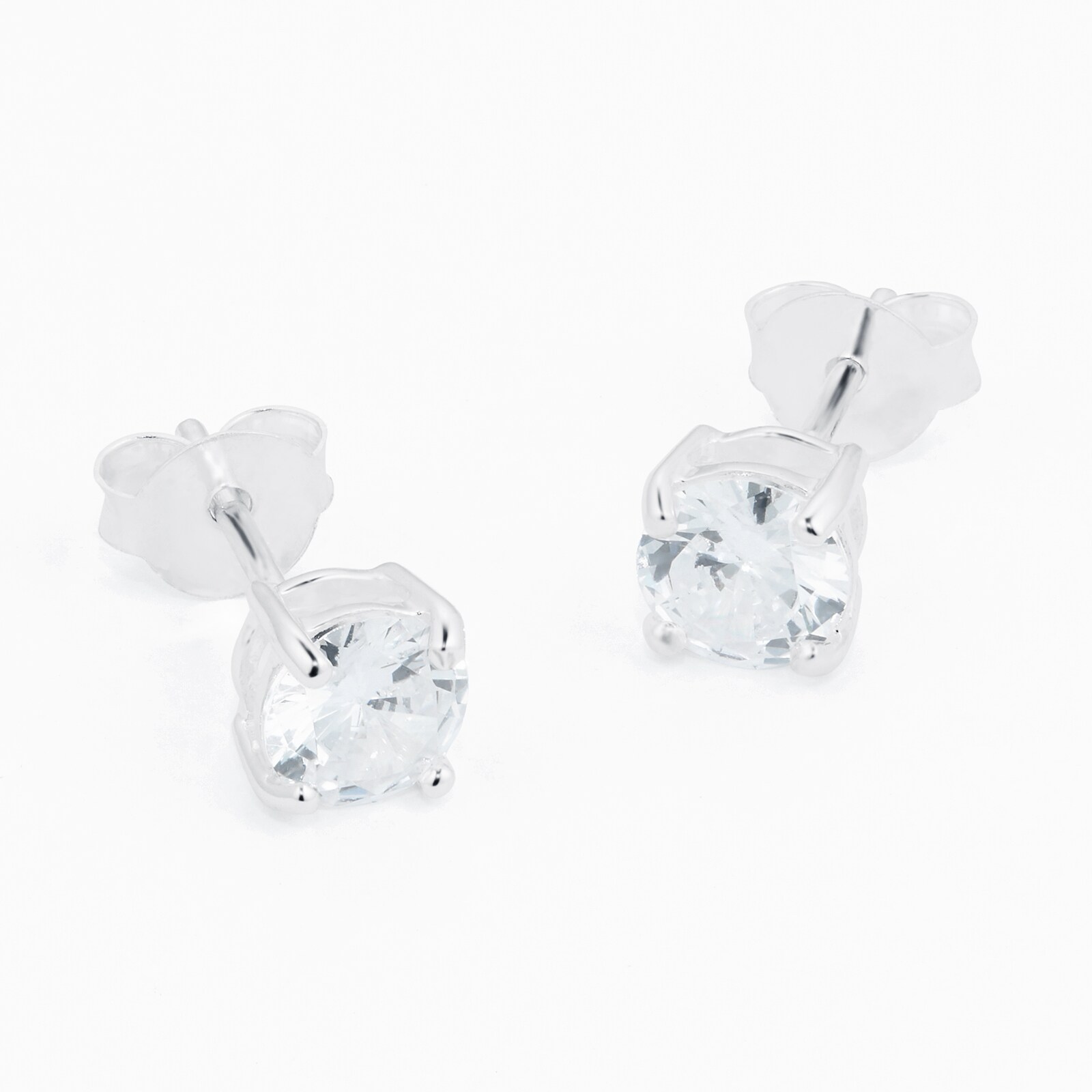 Polished Flower Diamond Stud Earrings, Pattern : Plain, Occasion : Casual  Wear at Best Price in Surat